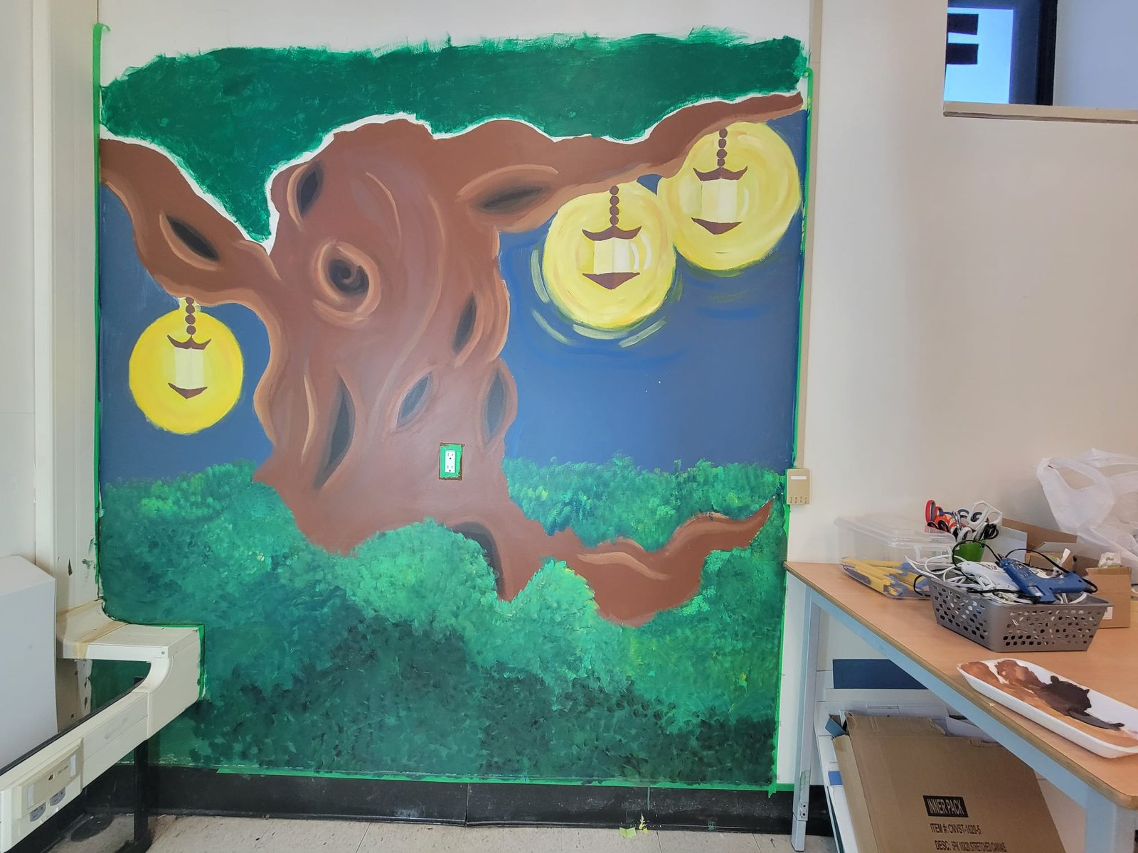 Tree mural in progress, early stage