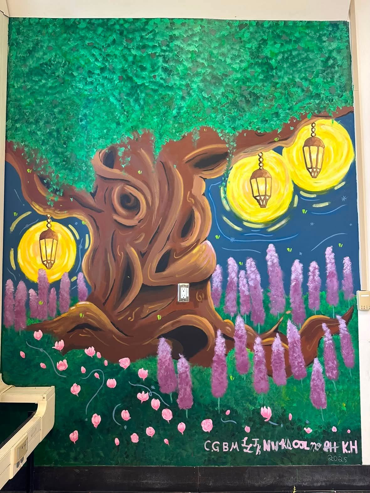 Tree mural with glowing lanterns